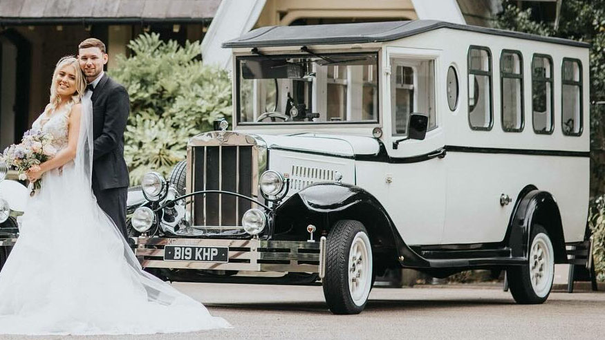 Bride and Groom ion Front of an Asquith Bus