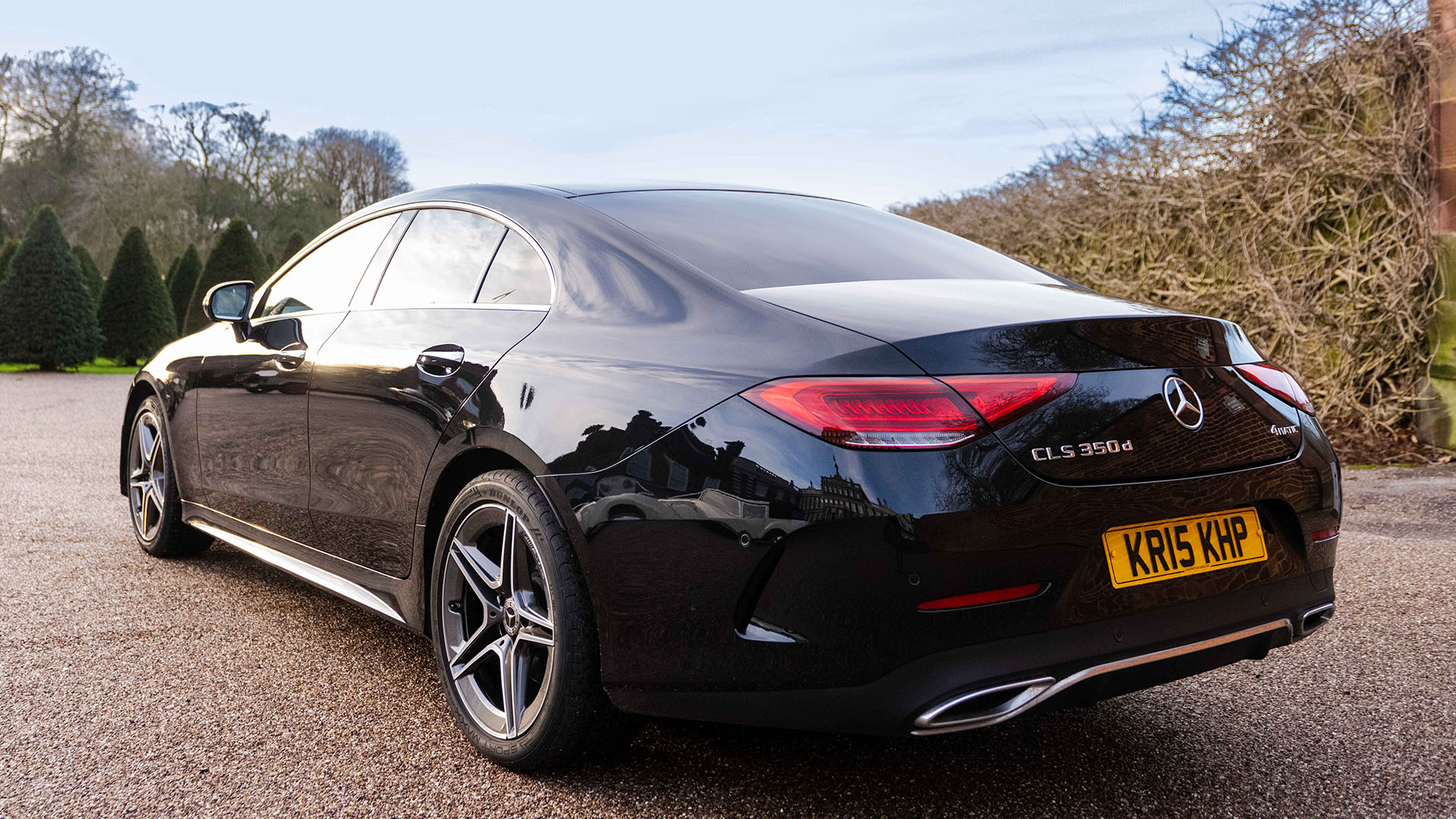 Rear view black Mercedes CLS coupe