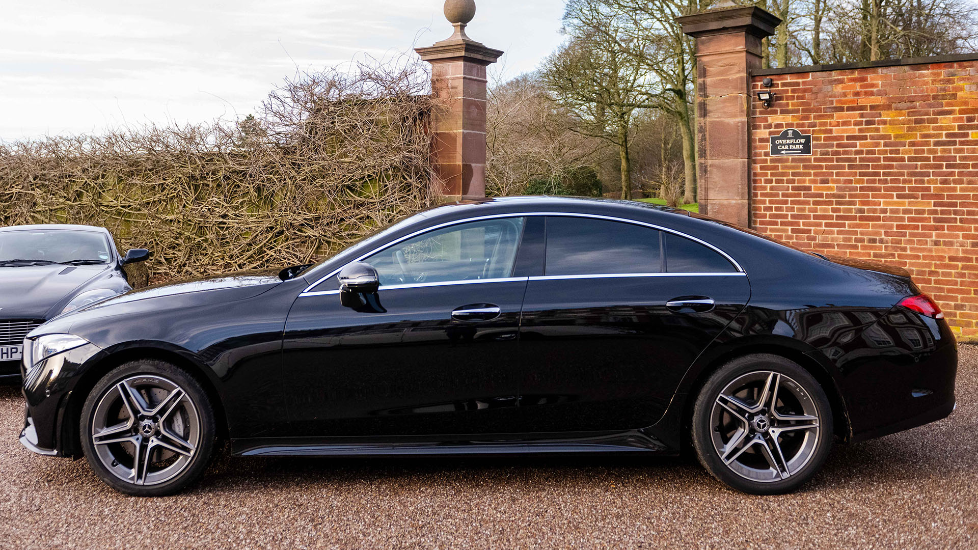 Left side view of black Mercedes CLS