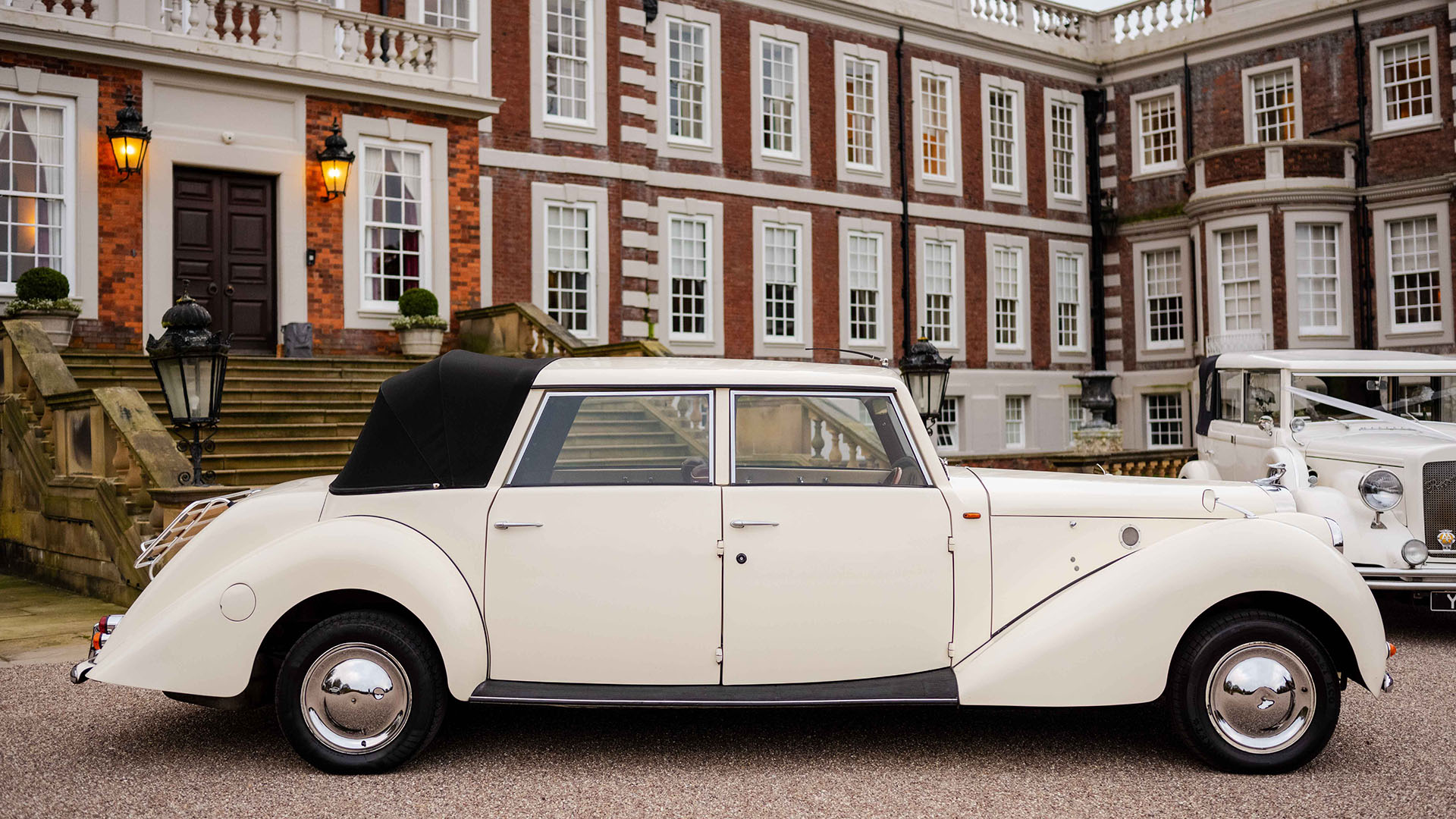 Right side view of Vintage Royale Windsor with black soft top rear convertible roof