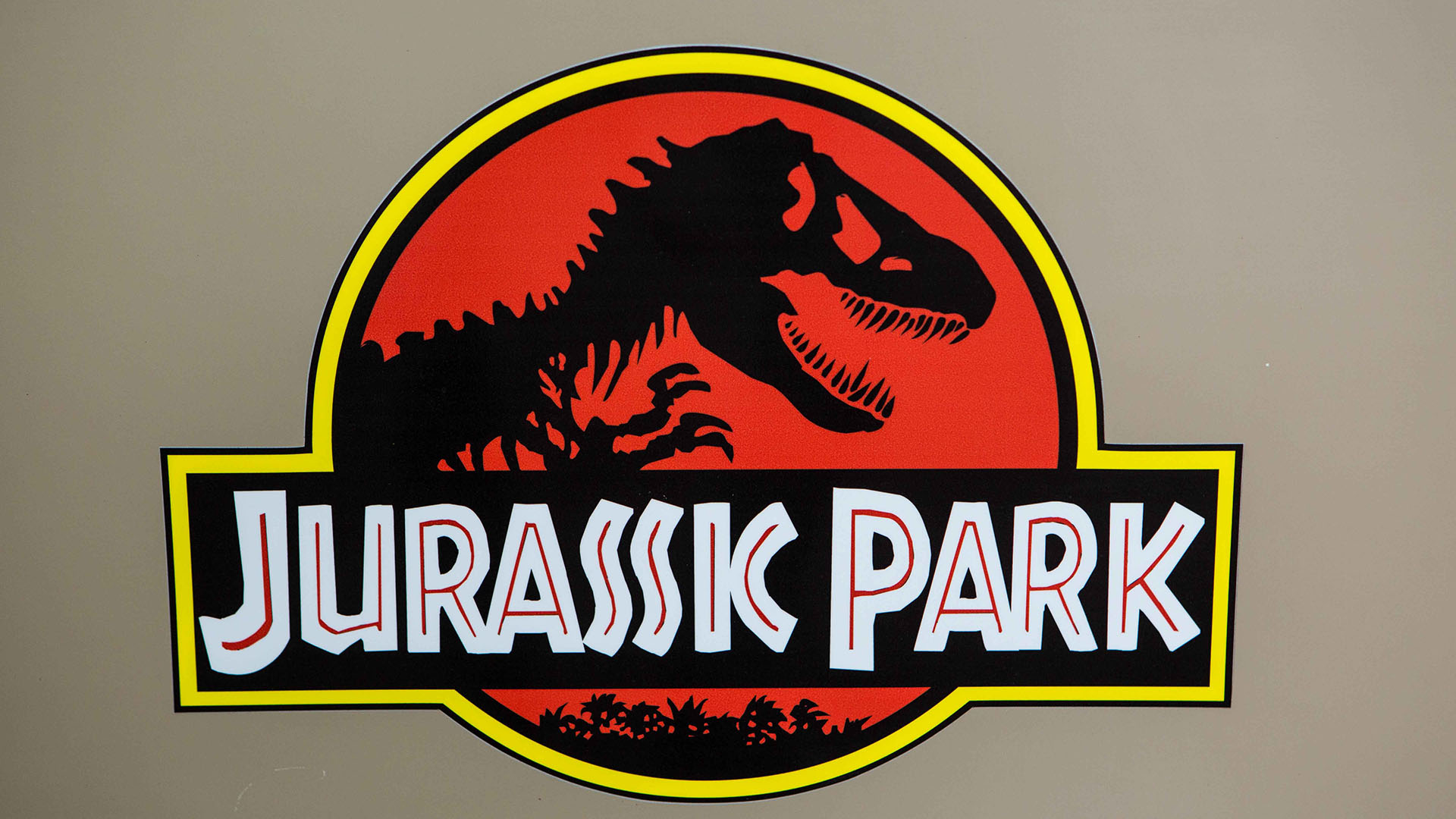 Close up view of Jurassic Park logo on Jeep's sand Beige door