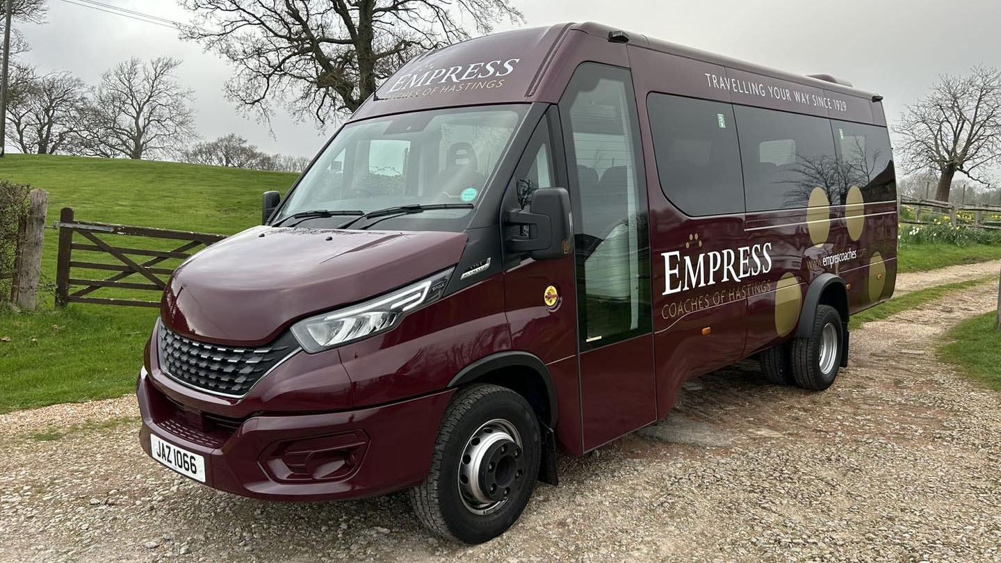 Burgundy 22-seats Modern Coach