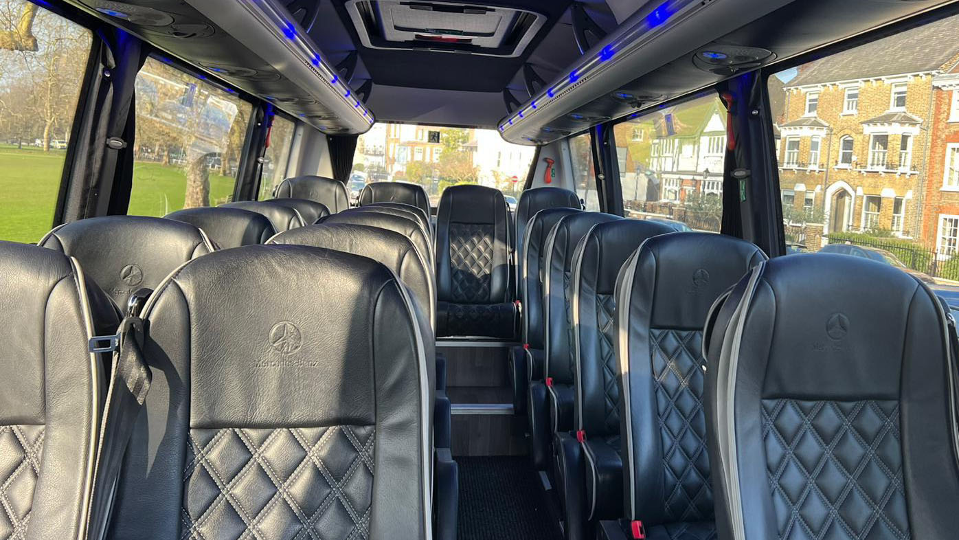 Mercedes Mini Bus interior of black leather with Blue LED lights