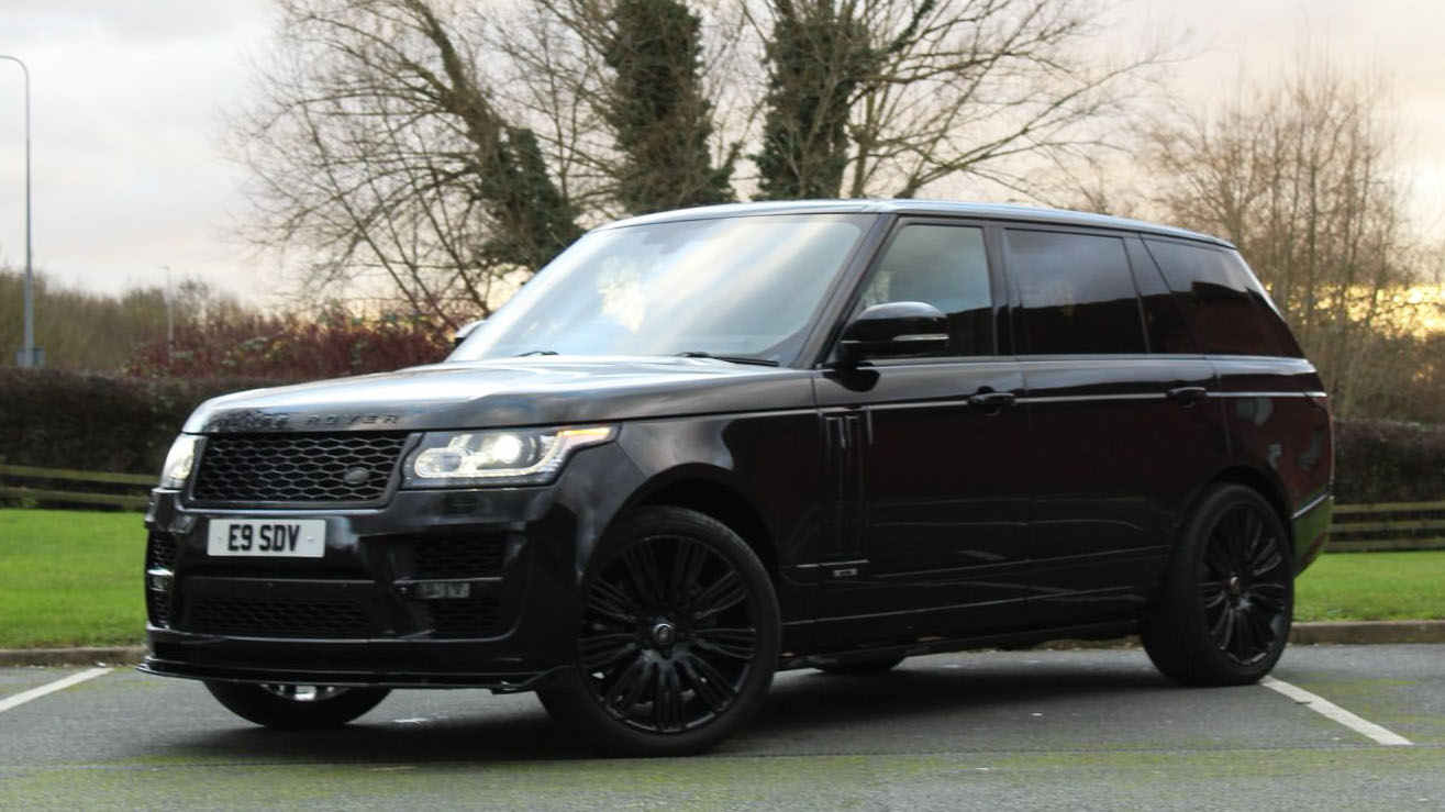 Black Range Rover Autobiography with black alloy wheels and privacy rear windows