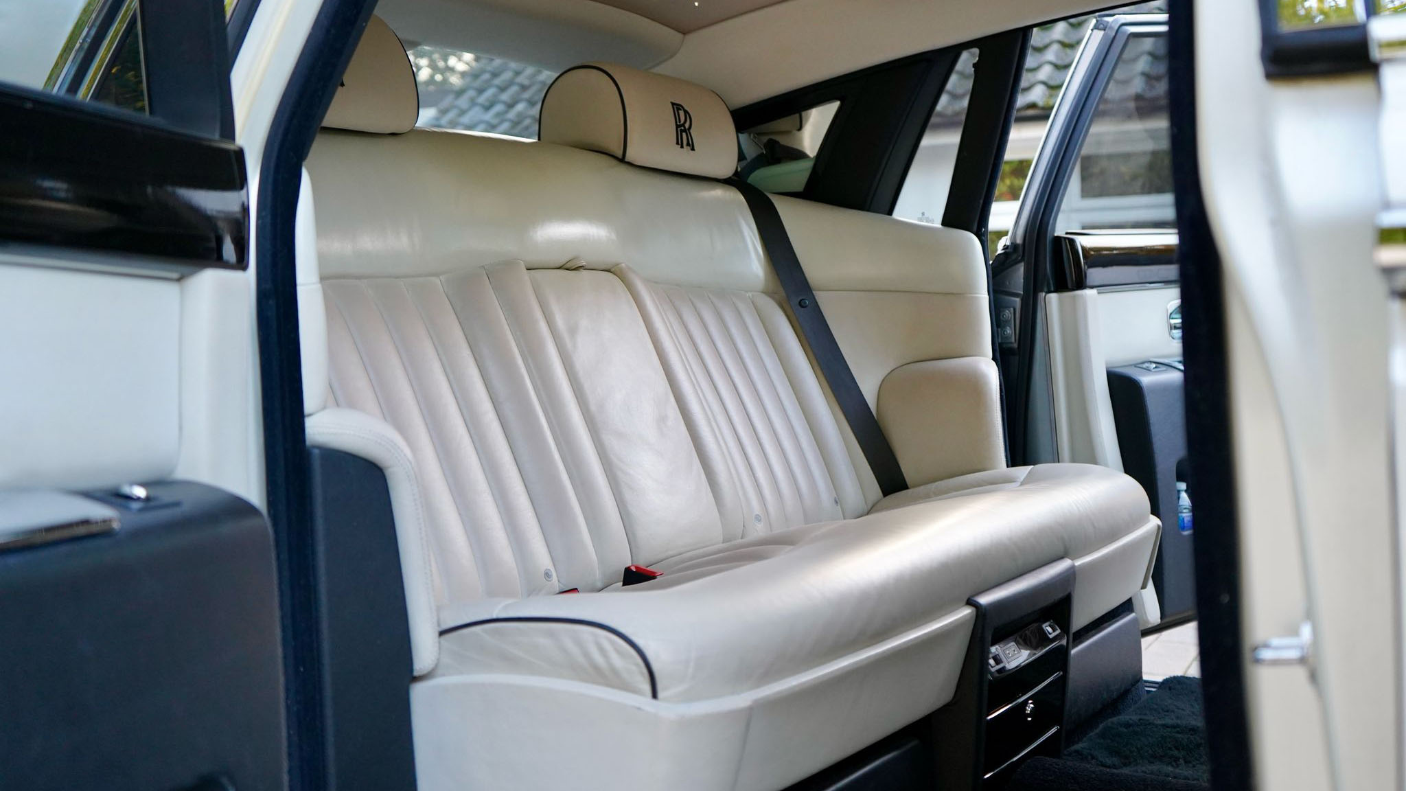 Black Rolls-Royce Phantom cream leather rear seat