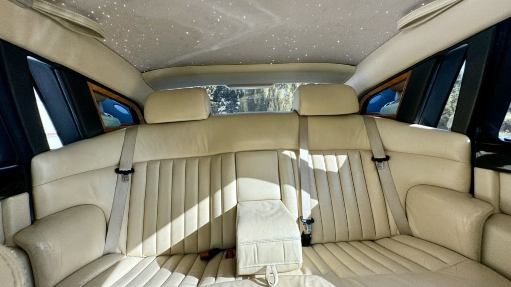 Black Rolls-Royce Phantom rear interior cream seat