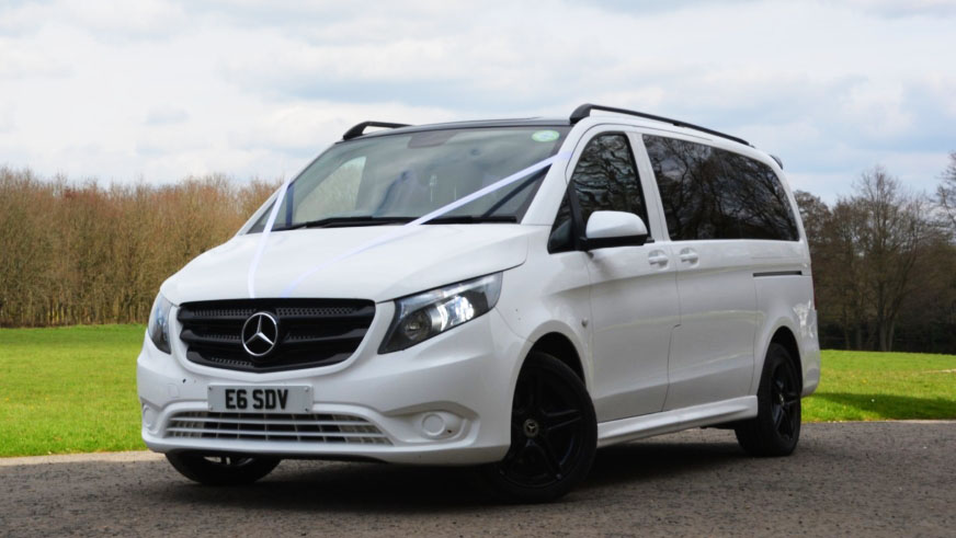 White V-Class Mercedes with black alloy wheels