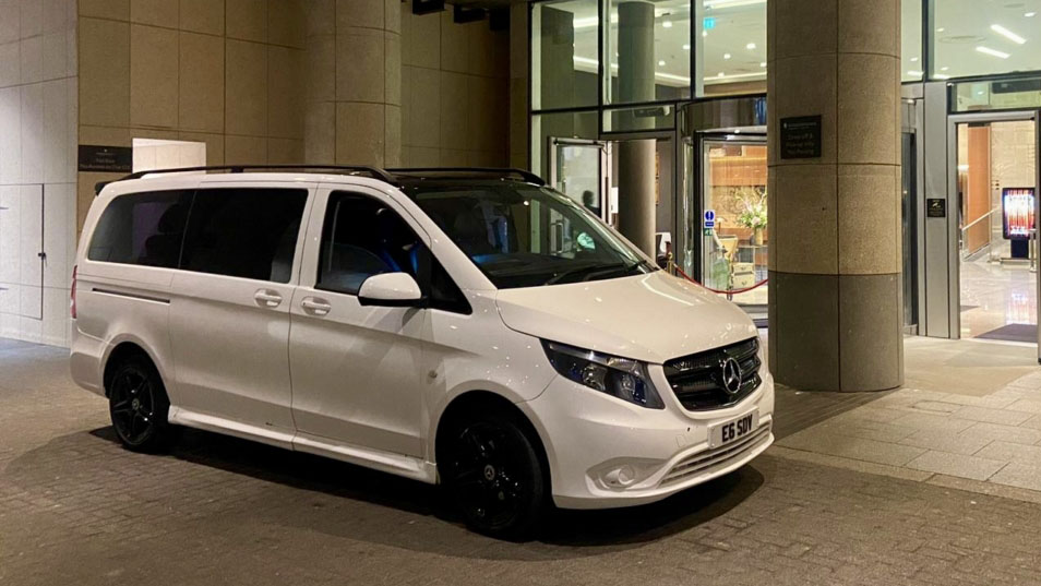 White Mercedes People Carrier parked in front of wedding venue in London