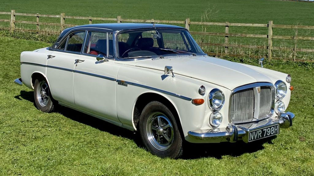 Cream Classic Rover with black roof