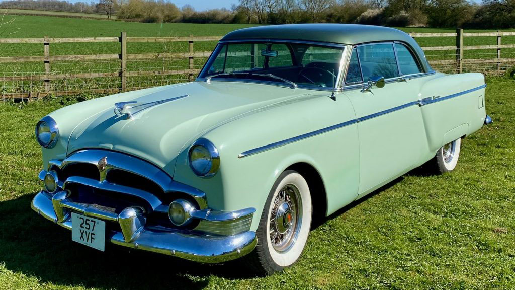 Pale Green American Packard Super Clipper with white wall tires