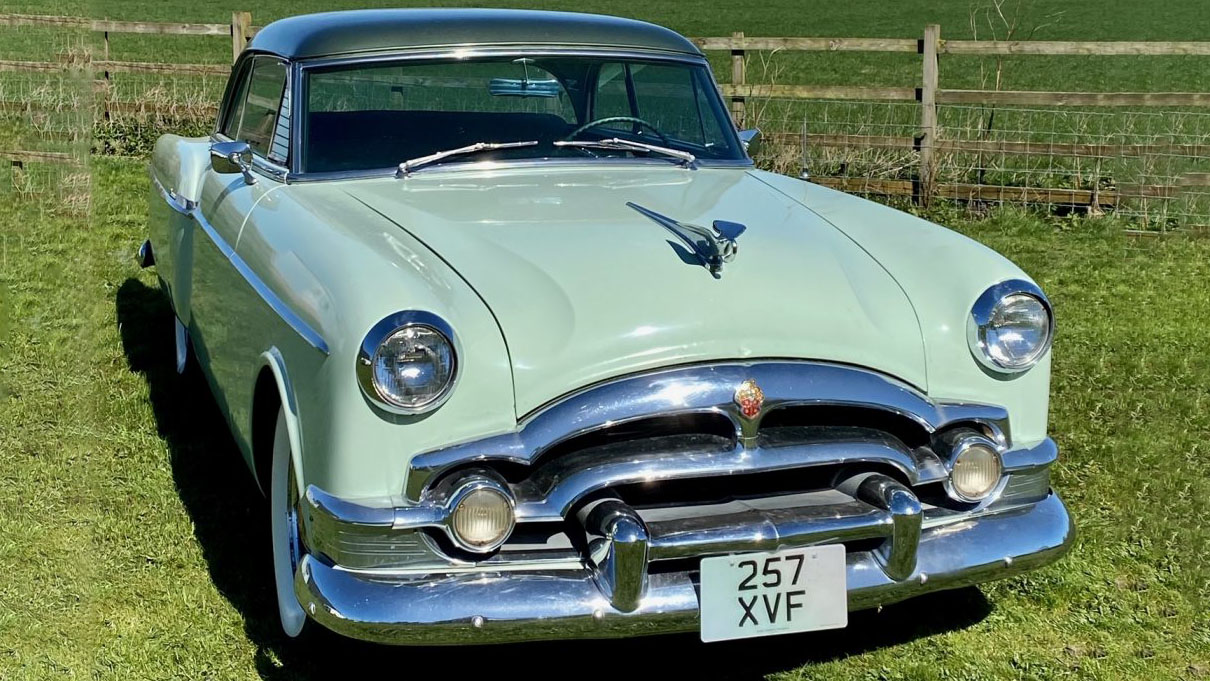 Front view of an American Packard Supler Clipper with large chrome grill and bumper