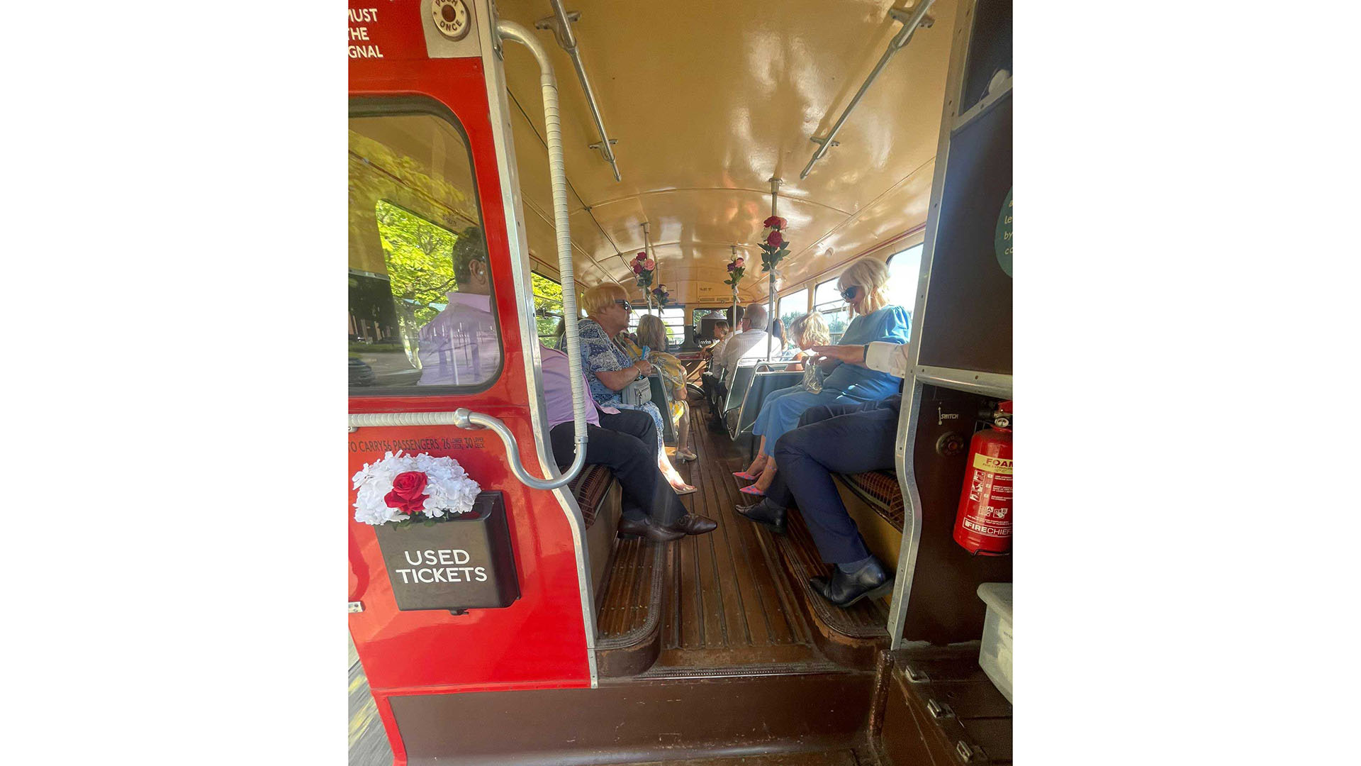 Interior with passengers eating inside classic bus