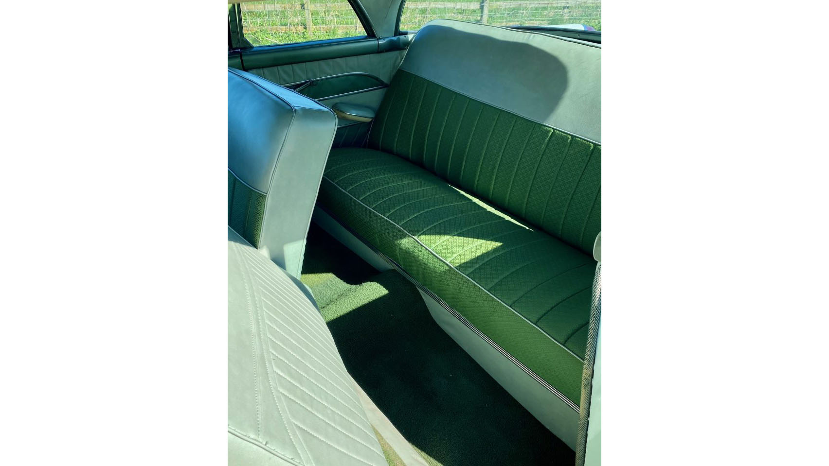 Rear interior bench seat in two-tone green