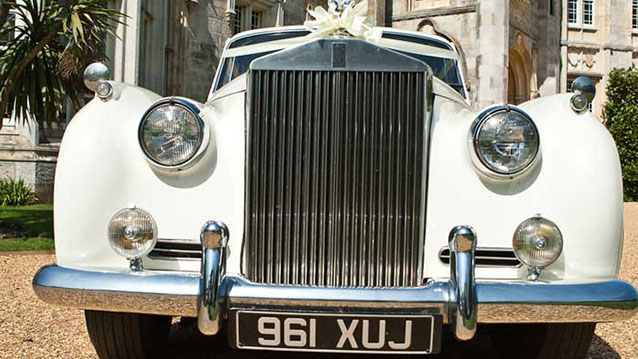 Front View showing iconic and imposing Rolls-Royce Grill and sprit of Ecstasy.