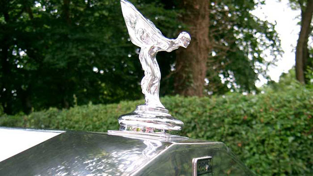 Rolls-Royce Spirit of Ecstasy emblem on top of the Chrome Grill