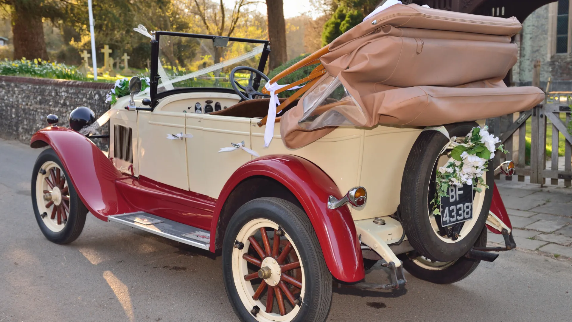rear left side view of Vintage Wedding with Convertible Roof open