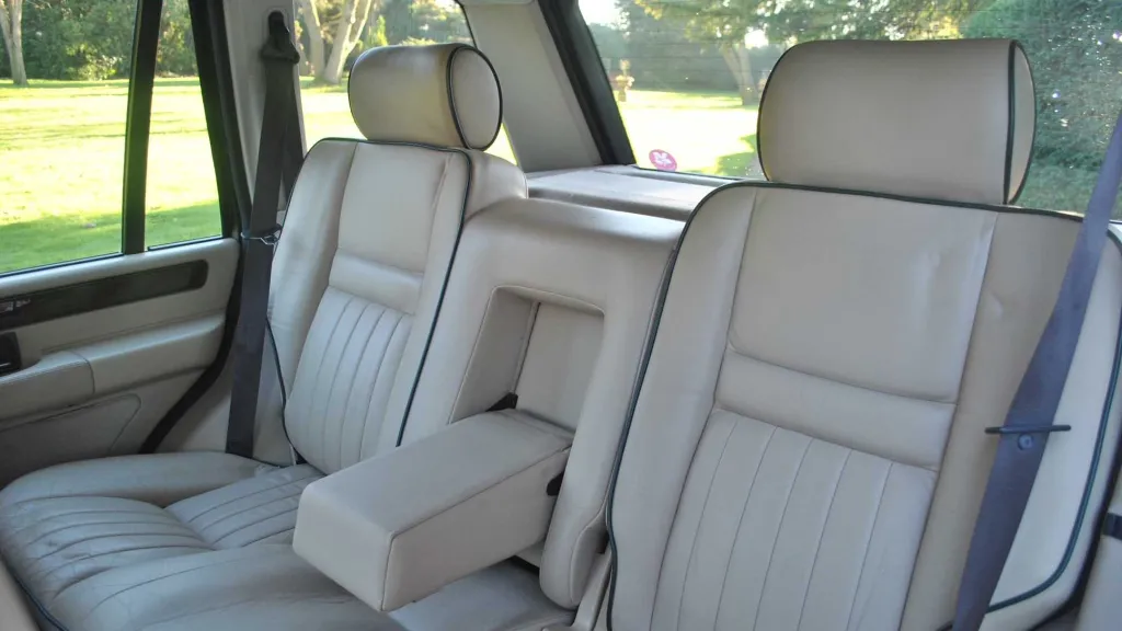 Rear interior with Cream Leather with armrest down