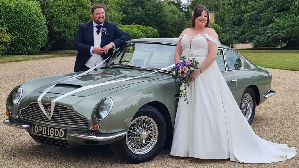 Adrian's Aston Martin was a beautiful car and the perfect choice for our wedding. It was a dream come true being driven in an Aston Martin for my wedding. My husband and I really enjoyed it, as did my dad and all our guests!&nbsp;Adrian was lovely and did a great job at driving us to and from our wedding and reception venue.
If you want a car that will add a lot of beautiful memories to your perfect day then I definitely recommend choosing Adrian and his gorgeous Aston Martin!&nbsp;Sarah &amp; Guy