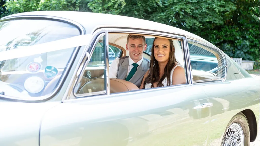 Adrian and his Aston Martin were fantastic. The colour of the car is gorgeous and Adrian helped ensure our day was special. The wedding car was an especially important element due to the groom working in motorsport, we couldn&rsquo;t recommend highly enough!&nbsp;Marianne and Alex.