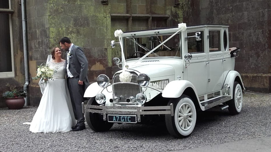 White imperial wedding car