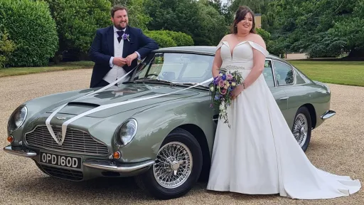 White V-shape Ribbons on Classic Aston Martin