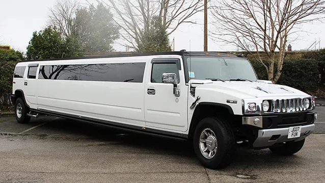 Hummer H2 Limousine in white with chrome wheels