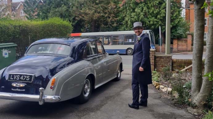 We hired a chauffeured Bentley S2 for our wedding in central Oxford and it made a perfect addition to the day. Not only was the car gorgeous and in fantastic condition, but the driver Marc was absolutely lovely - he helped keep everyone calm with friendly conversation during the drive and whilst waiting. My wife especially appreciated having someone to chat to to keep her calm before the wedding ceremony!It was a busy day in Oxford and there were lots of tourists and a folk festival full of morris dancers to navigate on the route (the car needed to drive through a mostly pedestrianised area) but we made the journey with no hitches or delays, and Marc navigated the crowded areas with no tourists or morris dancers harmed. The day included three trips for the car to bring people to the church before the ceremony and one to take the couple to the venue.The Premier Carriage website was easy to navigate and the representatives were responsive to non-standard requests like adding an extra trip to take the groom and ushers to the church.