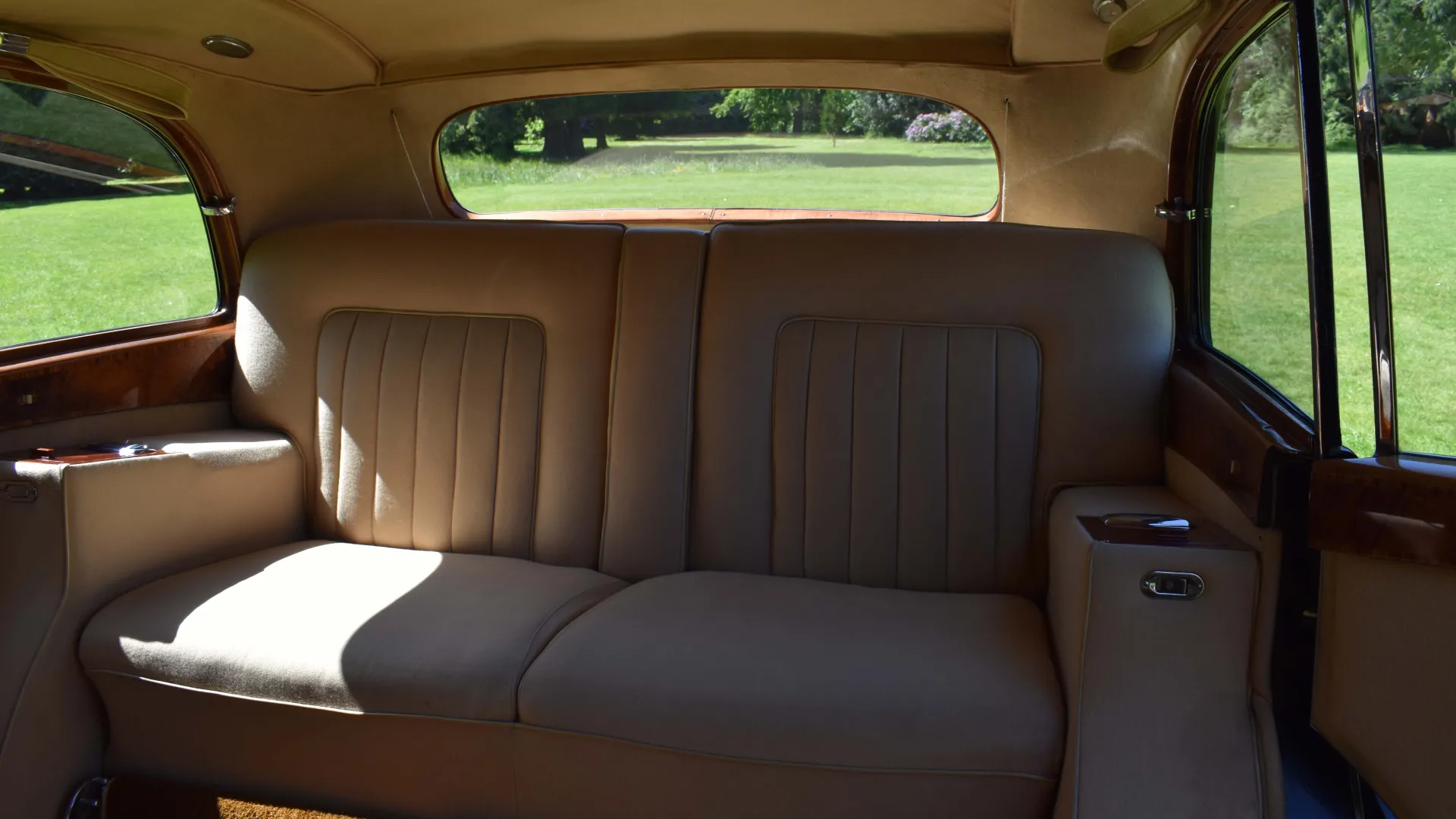 Rolls-Royce silver Wraith LWB rear bench seat in cream