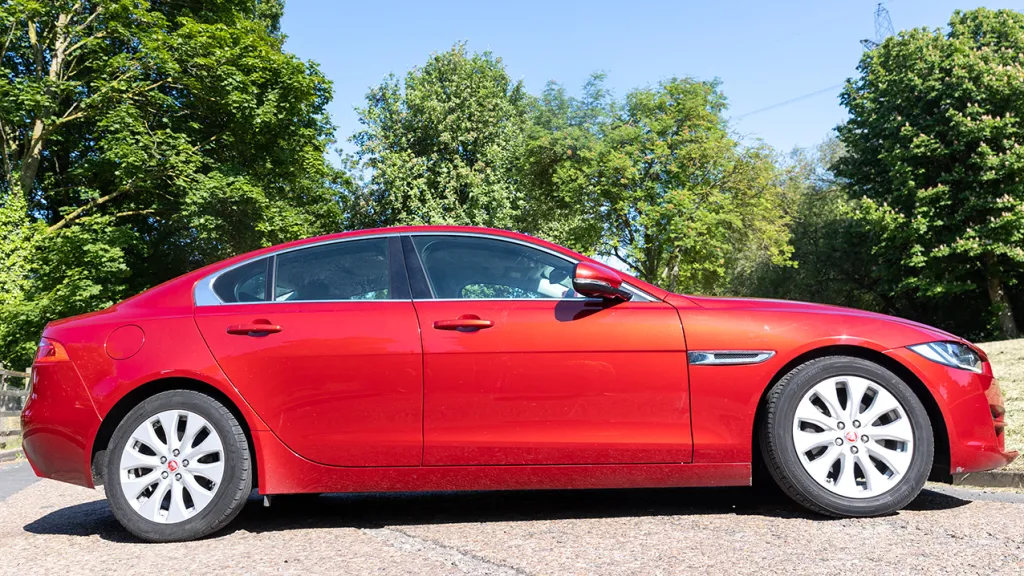Modern Red Jaguar XE right side view