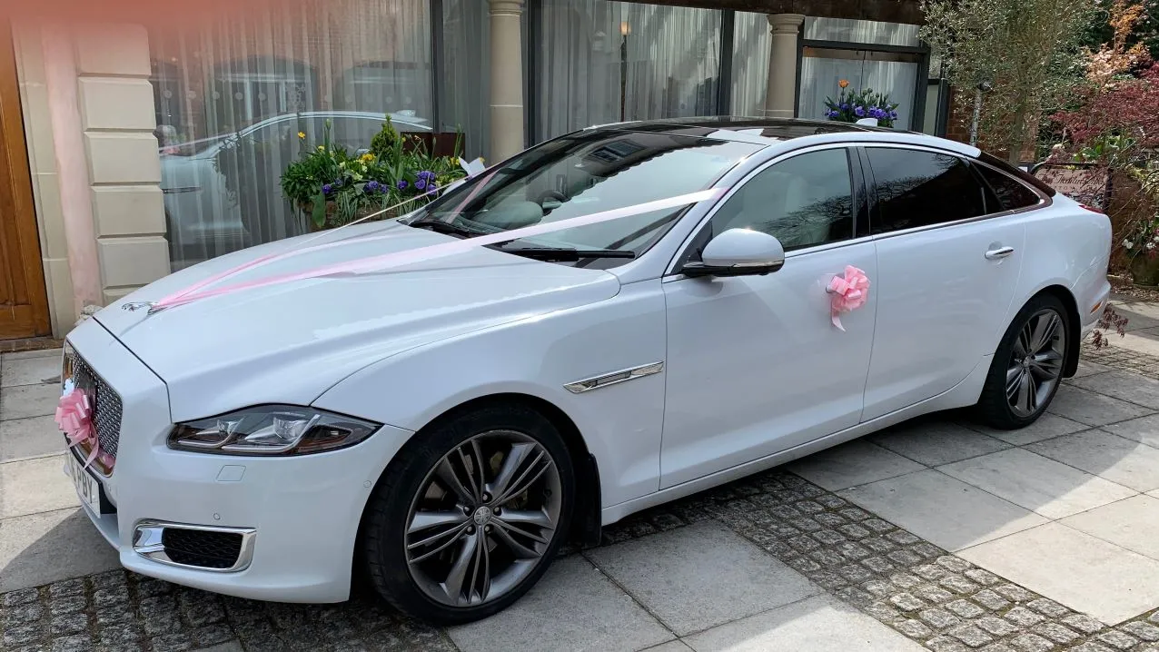 White Jaguar XJ LWB