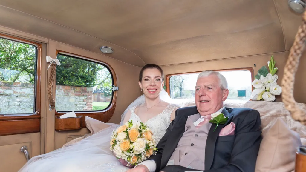 interior with bride and father smiling