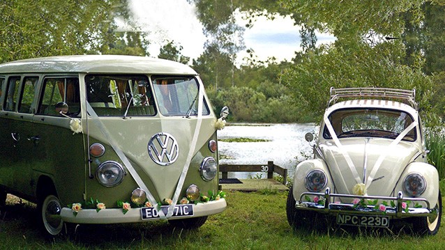 VW Beetle and Campervan Decoarated with Ribbons and Flowers